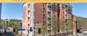 a red brick apartment building with a sign that says apply now for 2020 - 2021