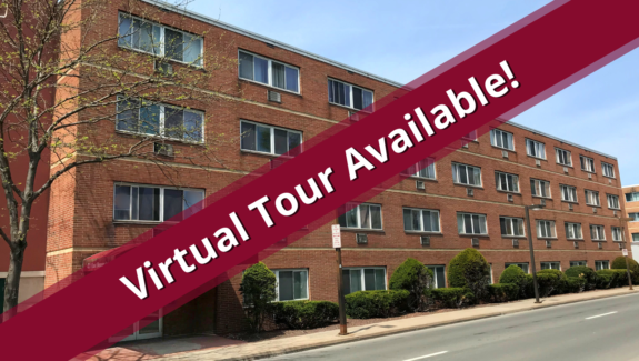Exterior of apartment building Ambassador that shows a virtual tour is available
