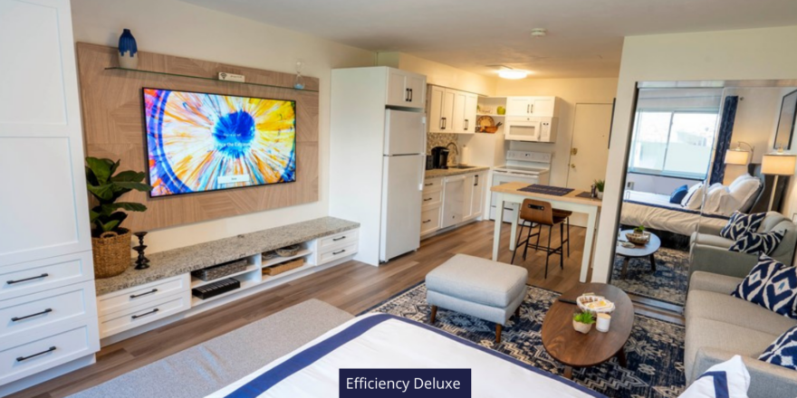 a living room filled with furniture and a flat screen tv