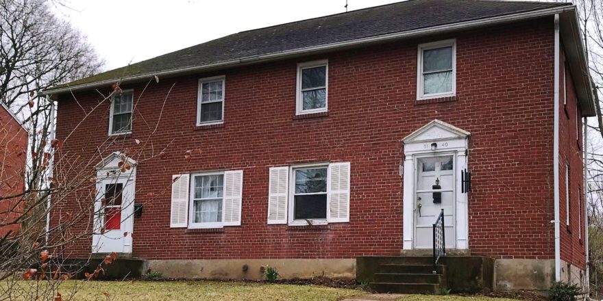 Exterior of brick duplex at 1140-1144 S Atherton Street