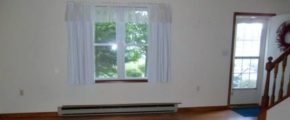 Unfurnished living room with large window