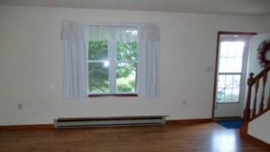 Unfurnished living room with large window