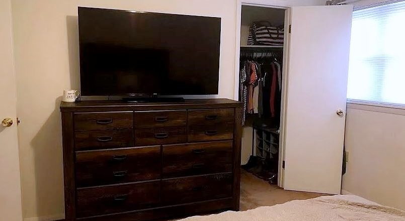 TV, dresser and closet