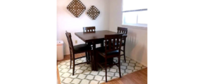 Dining area with table and chairs