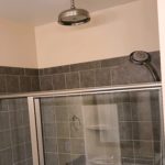 Shower stall with rain shower shower head