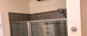 Shower stall with rain shower shower head