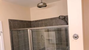 Shower stall with rain shower shower head