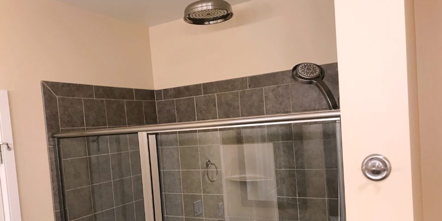 Shower stall with rain shower shower head