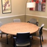 Conference room with large table and chairs