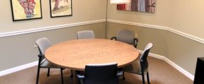 Conference room with large table and chairs