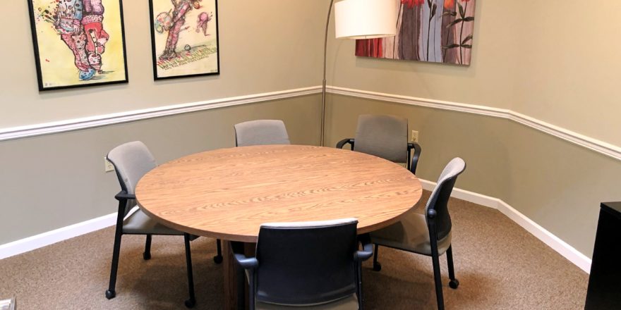 Conference room with large table and chairs