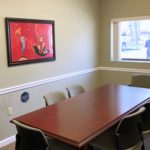 Conference room with large table and chairs
