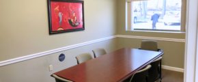 Conference room with large table and chairs