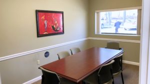 Conference room with large table and chairs