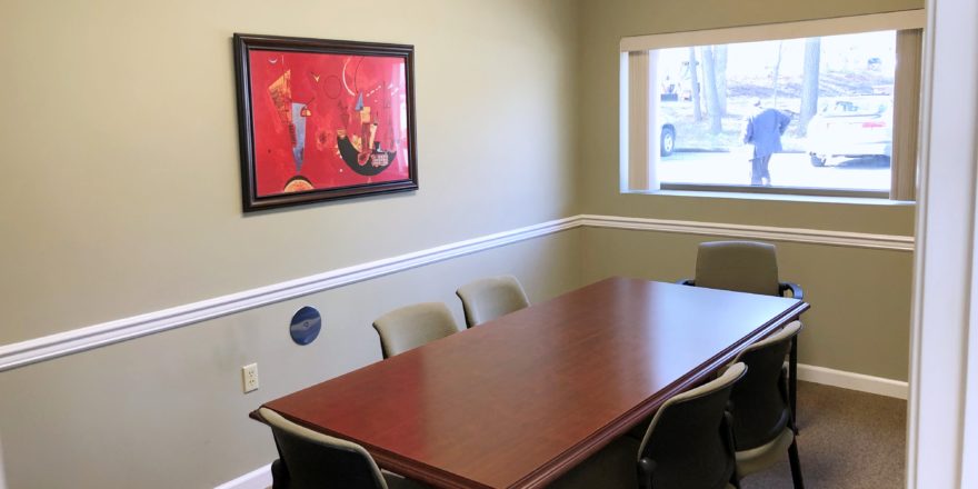 Conference room with large table and chairs