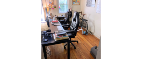 Office space with hardwood floor and furniture