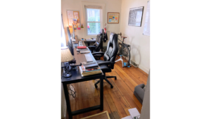 Office space with hardwood floor and furniture