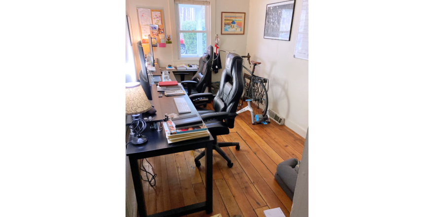 Office space with hardwood floor and furniture