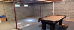 Unfinished basement with pool table
