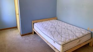 Bedroom with bed and closet