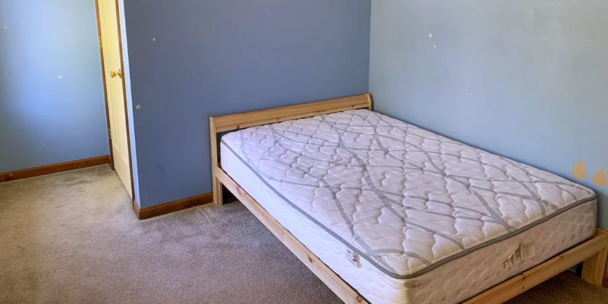 Bedroom with bed and closet