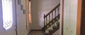 Entryway with stairwell and closet