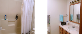 Bathroom with tub/shower combo with curtain, toilet, and vanity, and medicine cabinet with mirror