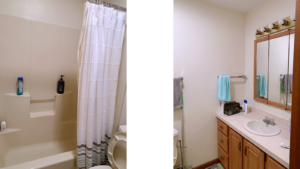 Bathroom with tub/shower combo with curtain, toilet, and vanity, and medicine cabinet with mirror