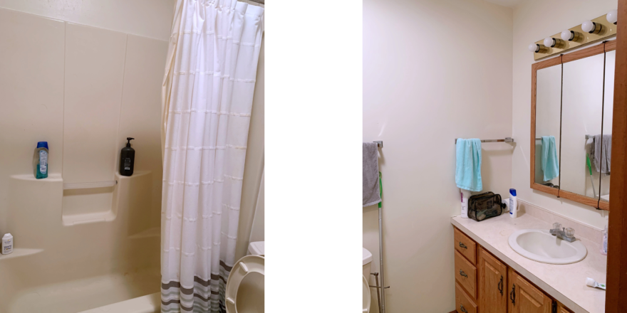 Bathroom with tub/shower combo with curtain, toilet, and vanity, and medicine cabinet with mirror