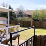 Yard with storage shed and large deck