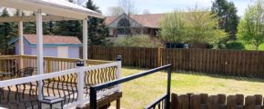 Yard with storage shed and large deck