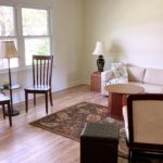 Living room with LVP flooring and furniture