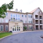Exterior of large apartment building 100 Jefferson
