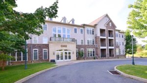 Exterior of large apartment building 100 Jefferson