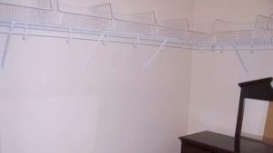 Closet with wire shelving and baskets