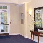 Hallway with table and plant