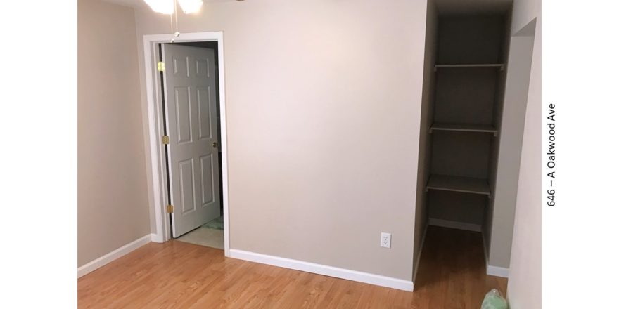 Bedroom with built-in shelving