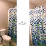 Full bathroom with tub/shower combo, toilet, vanity, and medicine cabinet