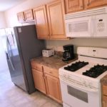 Kitchen with appliances and cabinets