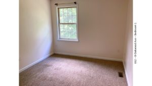 Carpeted, unfurnished bedroom