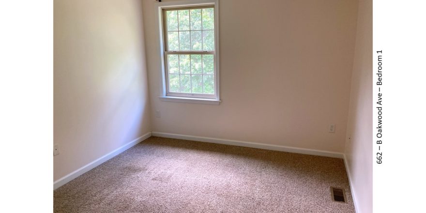 Carpeted, unfurnished bedroom