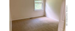 Carpeted, unfurnished bedroom