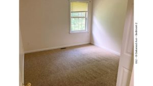 Carpeted, unfurnished bedroom
