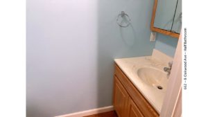 Vanity, medicine cabinet, and towel rack