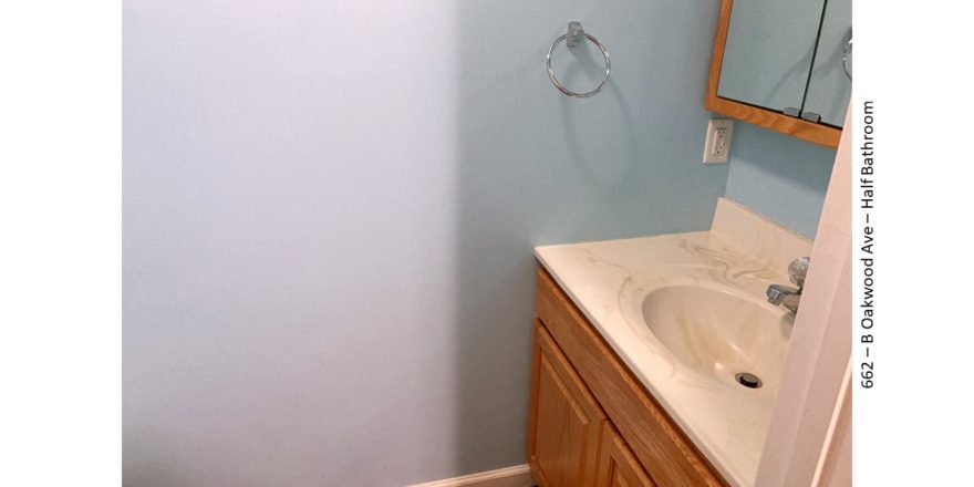 Vanity, medicine cabinet, and towel rack