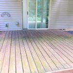 Wood patio with glass sliding door