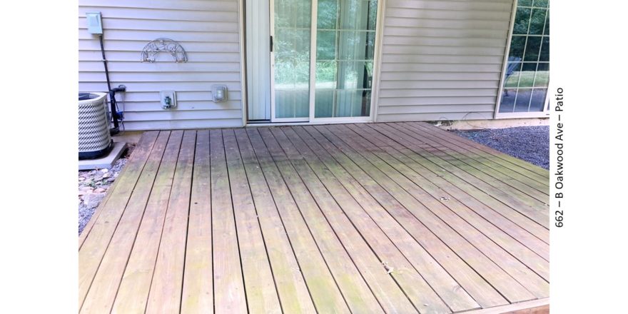 Wood patio with glass sliding door