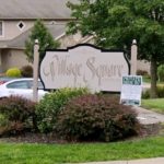 Sign for Village Square condominums