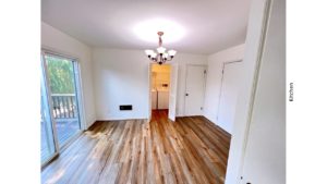 Kitchen eating area with access to deck and laundry room