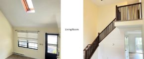 Carpeted, unfurnished living room with staircase, large windows and cathedral ceiling